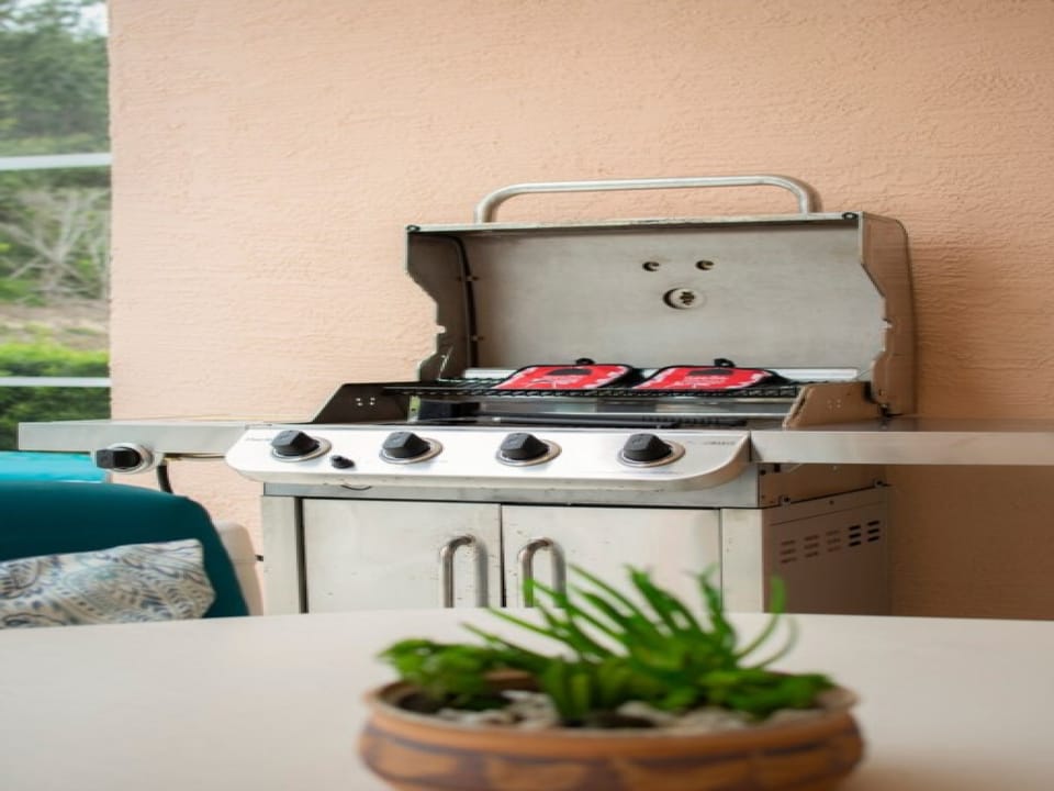 Outdoor barbecue grill, perfect for hosting family cookouts.