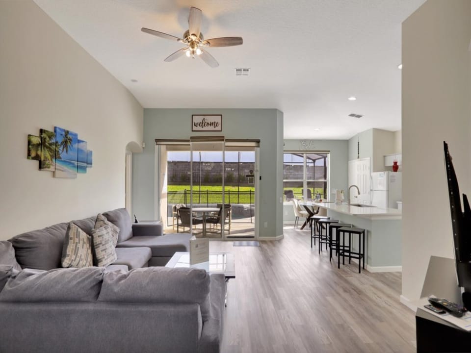 Bright and airy living space with modern furnishings and ample natural light.