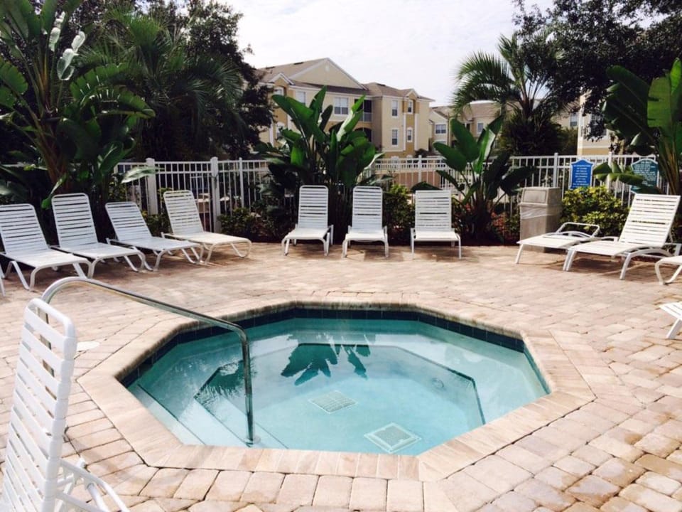 Relax in the inviting hot tub, the perfect way to unwind after a busy day.