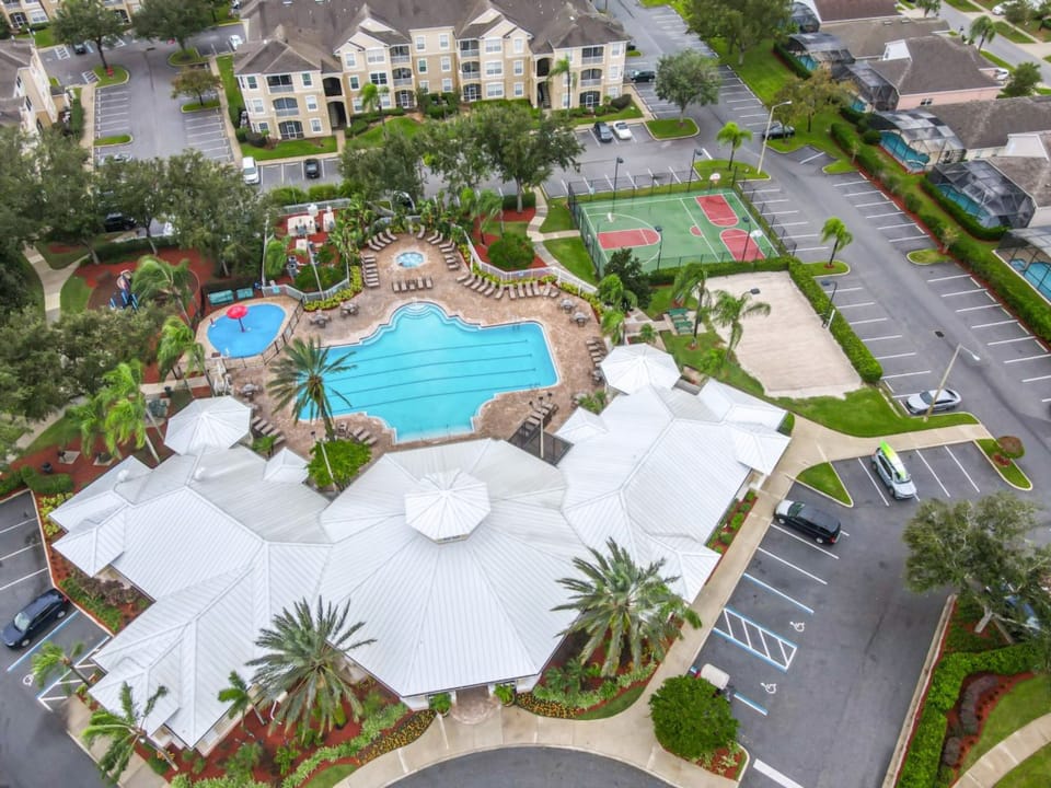 Windsor Palms - Aerial View, community pool surrounded by lush landscaping and plenty of seating