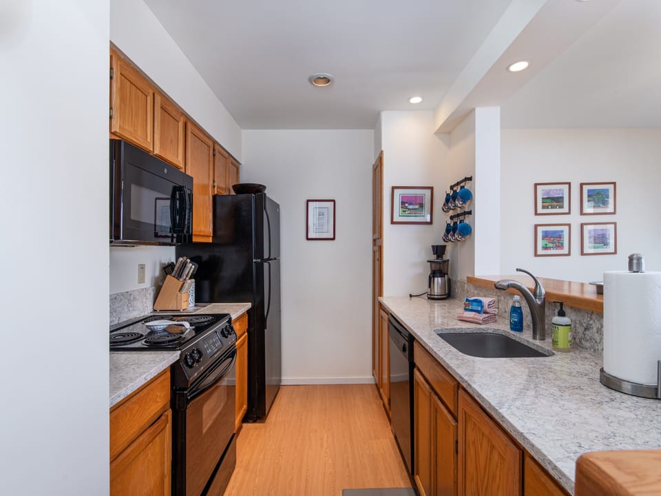 Fully stocked kitchen with modern appliances - everything you need to cook and entertain