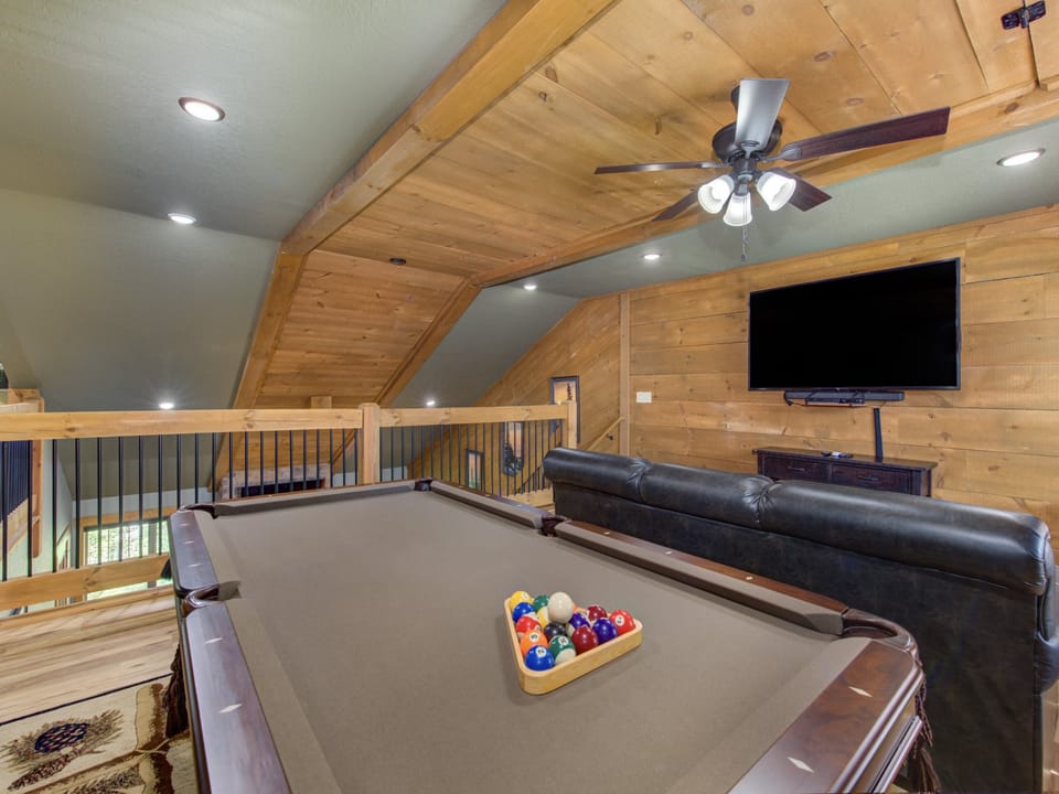 Pool Table and loft seating area