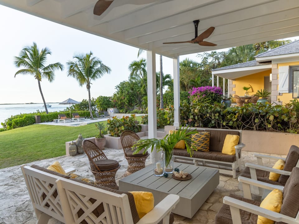 View from the main house.  Enjoy outdoor living with lounging and dining options.