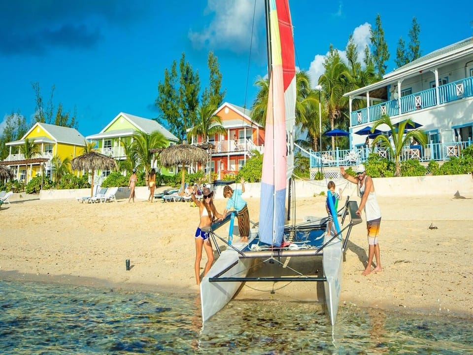 Sailing off our beach.