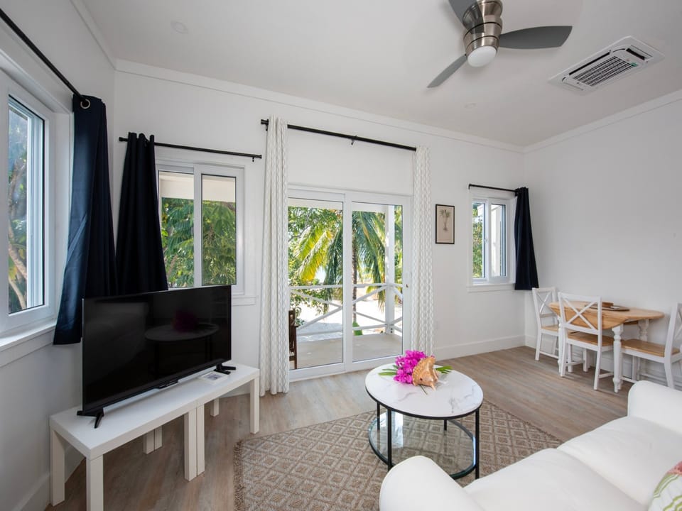 Spacious living area with Smart TV.
