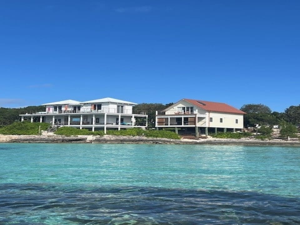 The two adjacent houses that make up Touch of Class Estate.  Touch of Class Villa is on the left and Touch of Class Cottage is on the right.