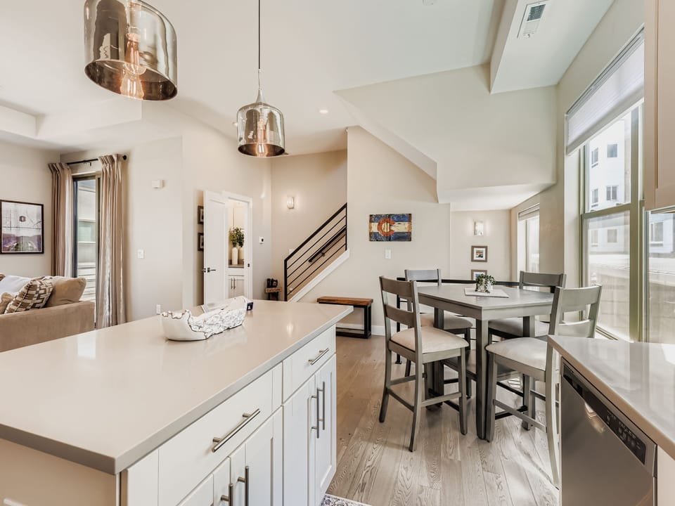 Cook dinner while your guests relax in the attached dining space.