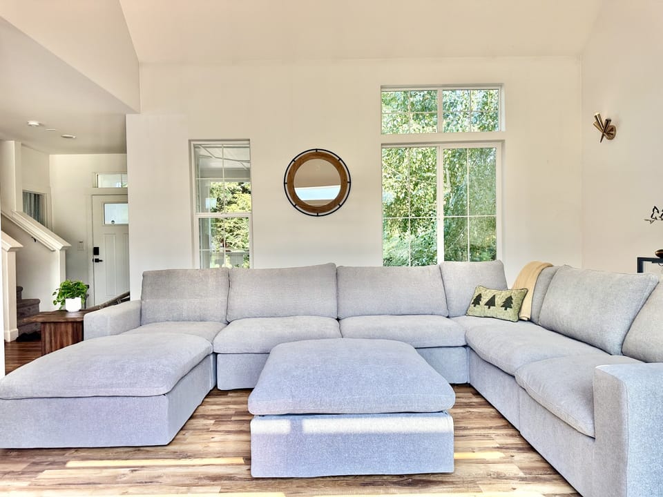 Cozy and open living space with high ceilings