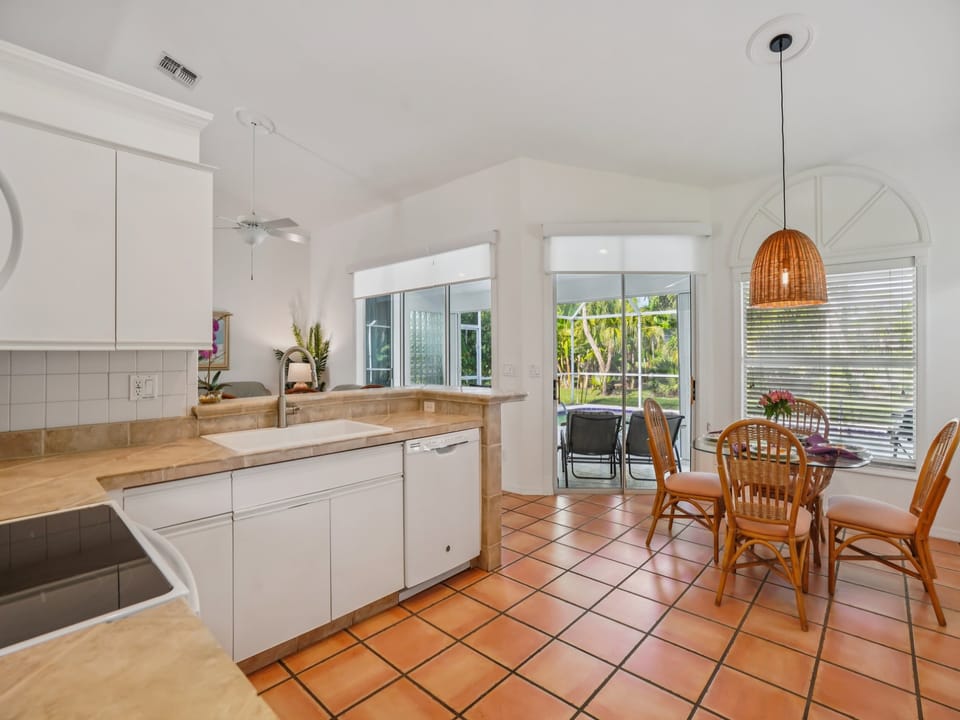 fully equipped kitchen, inviting dining area