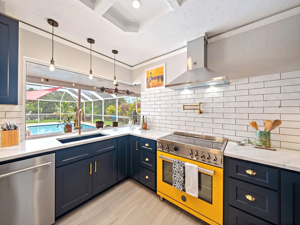 Large updated kitchen overlooking the pool area and perfect for the culinary enthusiast.