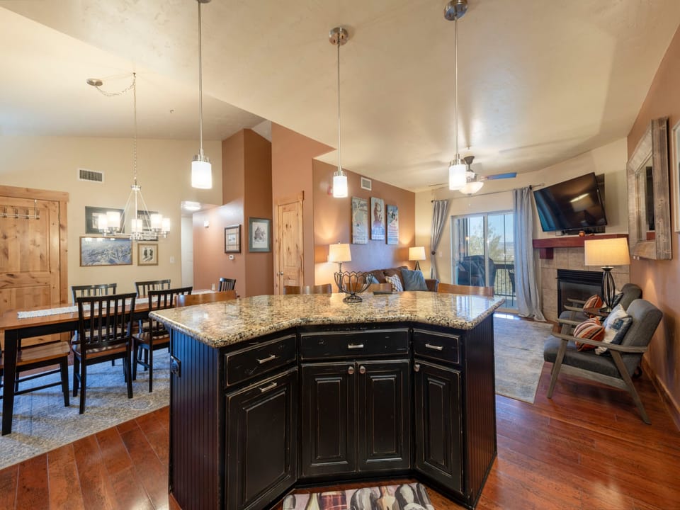 Well-equipped kitchen with ample counter space and inviting dining area.