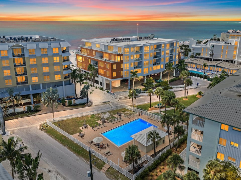 Enjoy gorgeous sunset views from Siesta Key Beach, just steps away from the heated pool and villa!