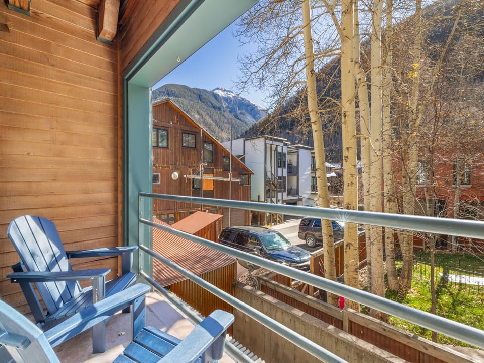 Private deck off the living area with views of the surrounding area.