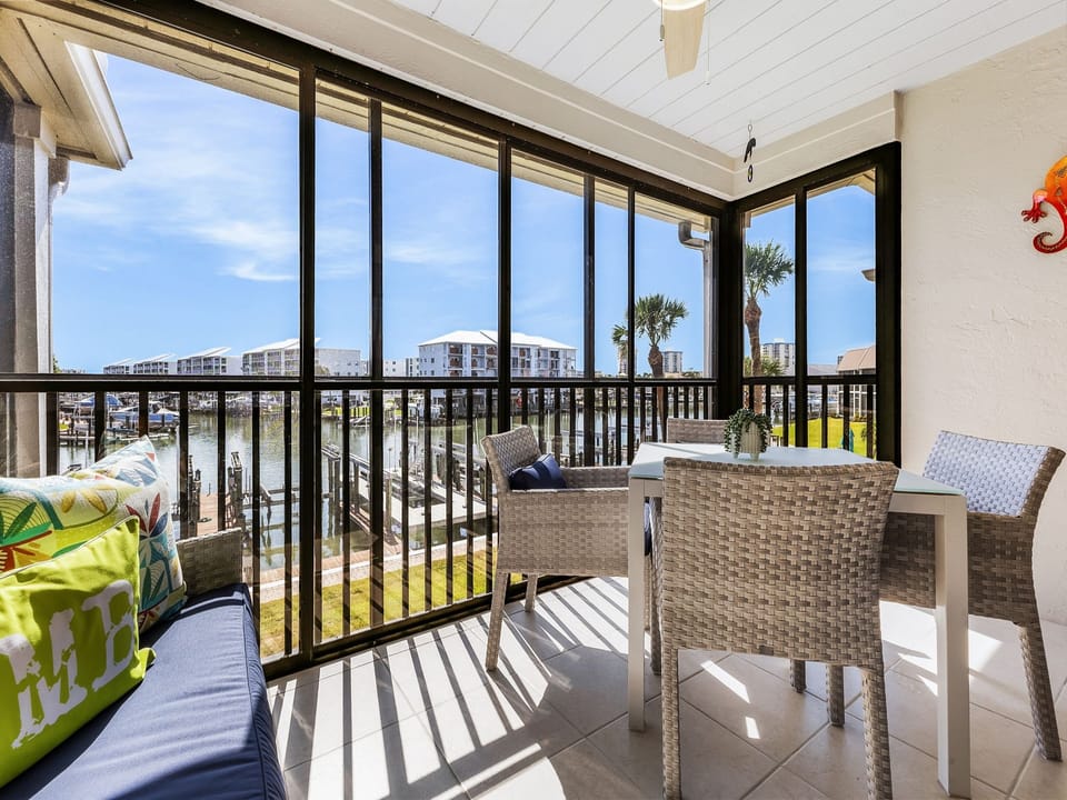 Screened lanai with canal views