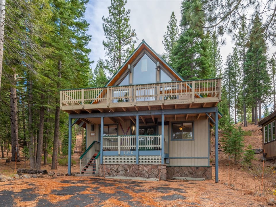 Your perfect forest retreat awaits with its charming A-frame design and wraparound deck where you can sip your morning coffee surrounded by towering pines and fresh mountain air.