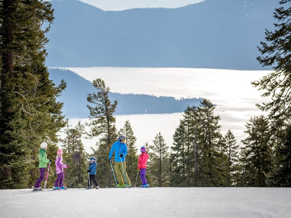 Imagine your family carving perfect turns through pristine powder with breathtaking mountain vistas stretching endlessly before you—this is where your alpine adventure begins.