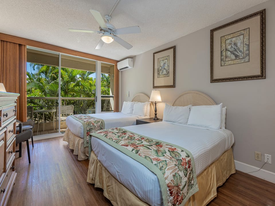 Spacious studio with two queen beds and bright tropical style