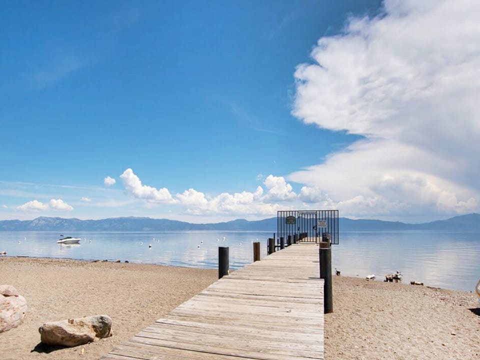 Take a walk around the corner to the HOA beach and private pier, access included with your booking.