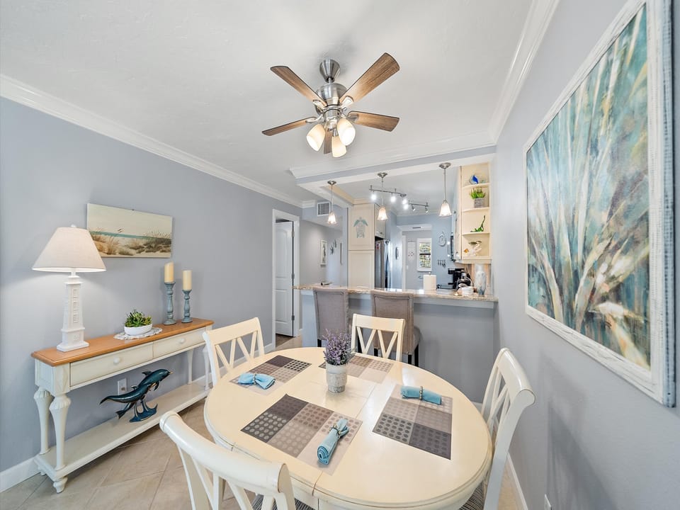 Gather around your spacious dining table with seating for six, perfectly positioned next to your fully equipped kitchen for memorable meals together.