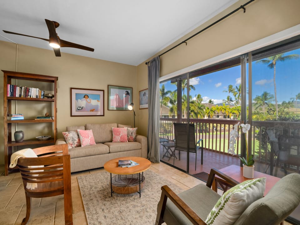 Step into your tropical retreat where comfort meets paradise. Relax with ocean breezes flowing through open doors to your private balcony overlooking swaying palms.