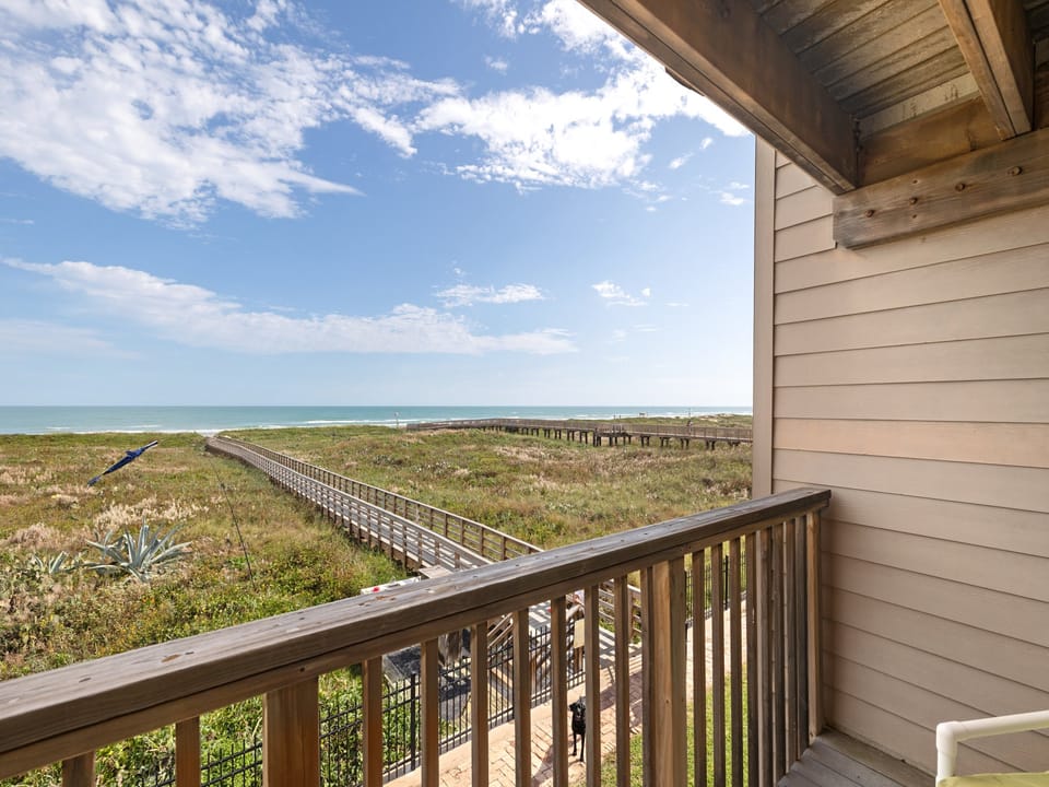 Start your day with peaceful beach and dune views from your private balcony