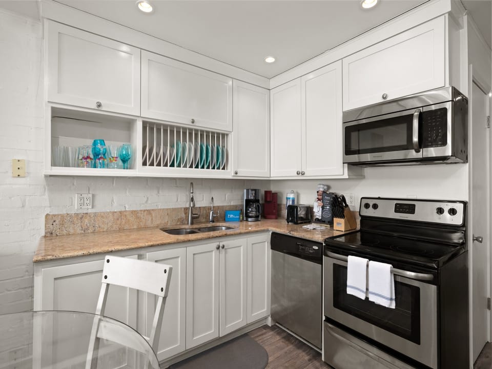 Bright, clean kitchen with plenty of space to cook and prepare meals with ease.