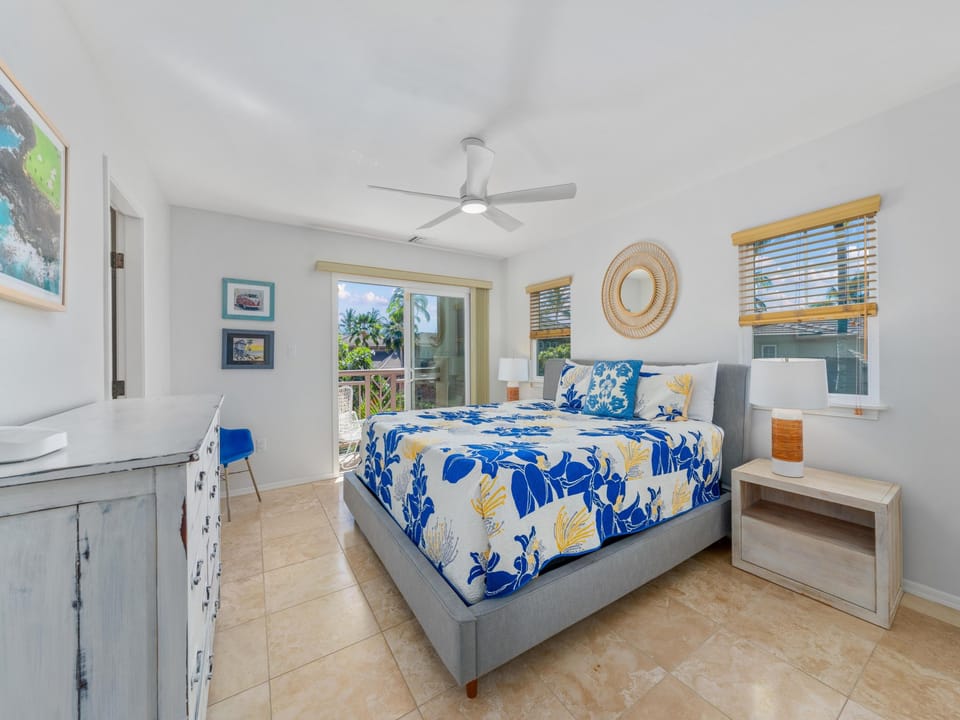 Wake up refreshed in your bright, coastal-inspired bedroom with tropical views and modern comfort.