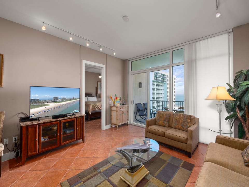 Tastefully designed living room with ocean views, offering a perfect space for relaxation and entertainment.
