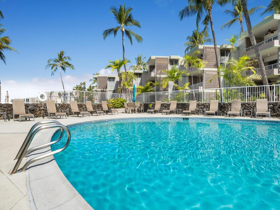 Relax poolside with ocean breezes and island sunshine