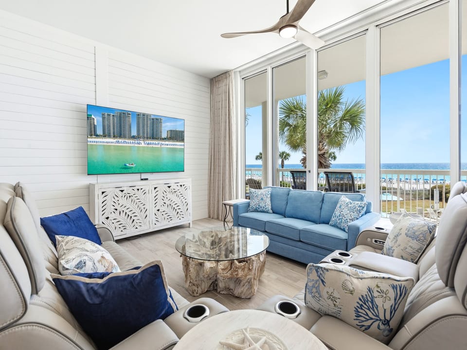 Relax in your coastal living room with stunning sea views and elegant furnishings designed for your ultimate beach getaway comfort.