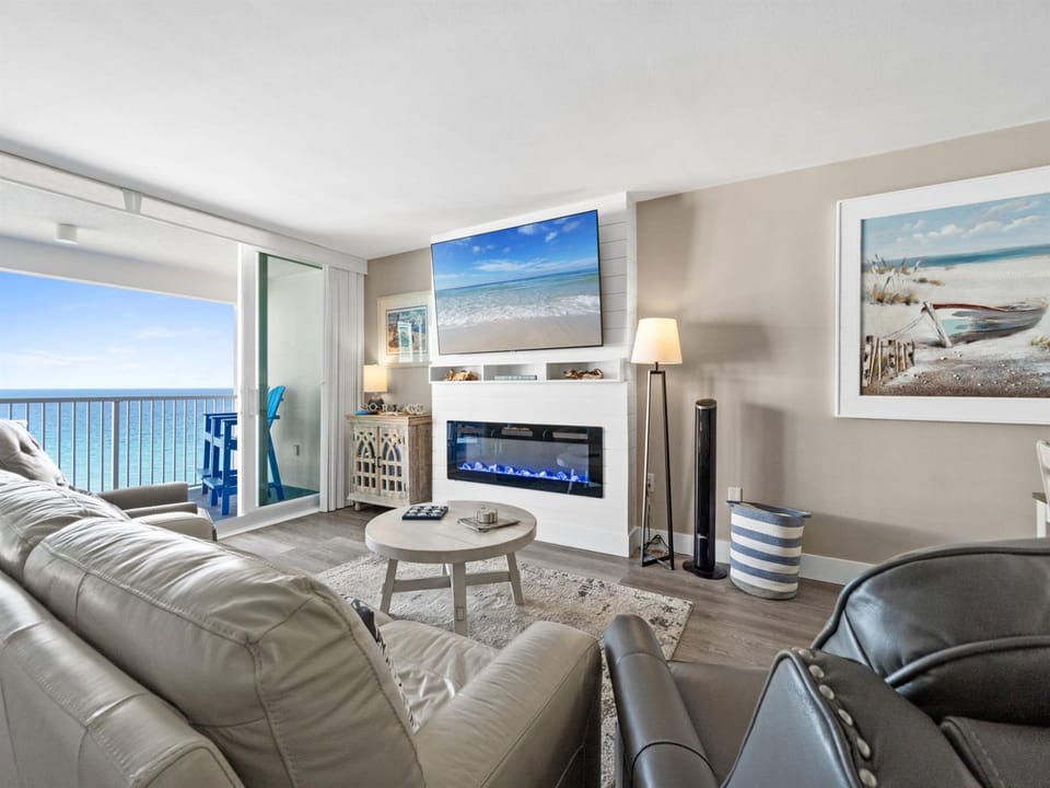 Sink into plush leather seating while ocean waves dance outside your window. Your cozy fireplace and stunning sea views create the perfect retreat.