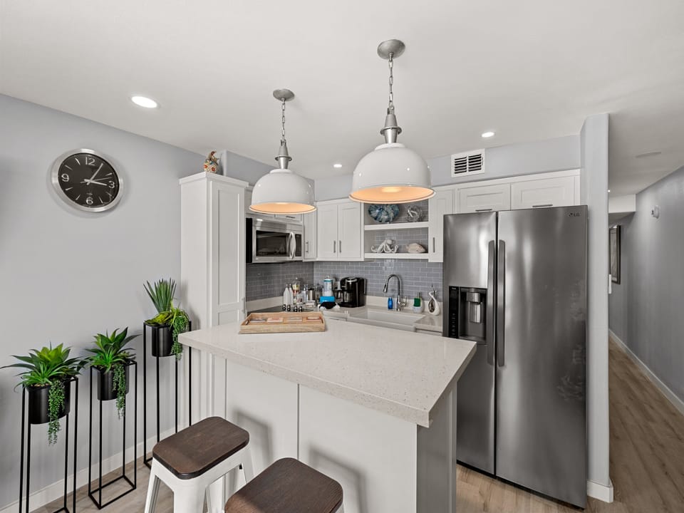Fully equipped kitchen with modern appliances.