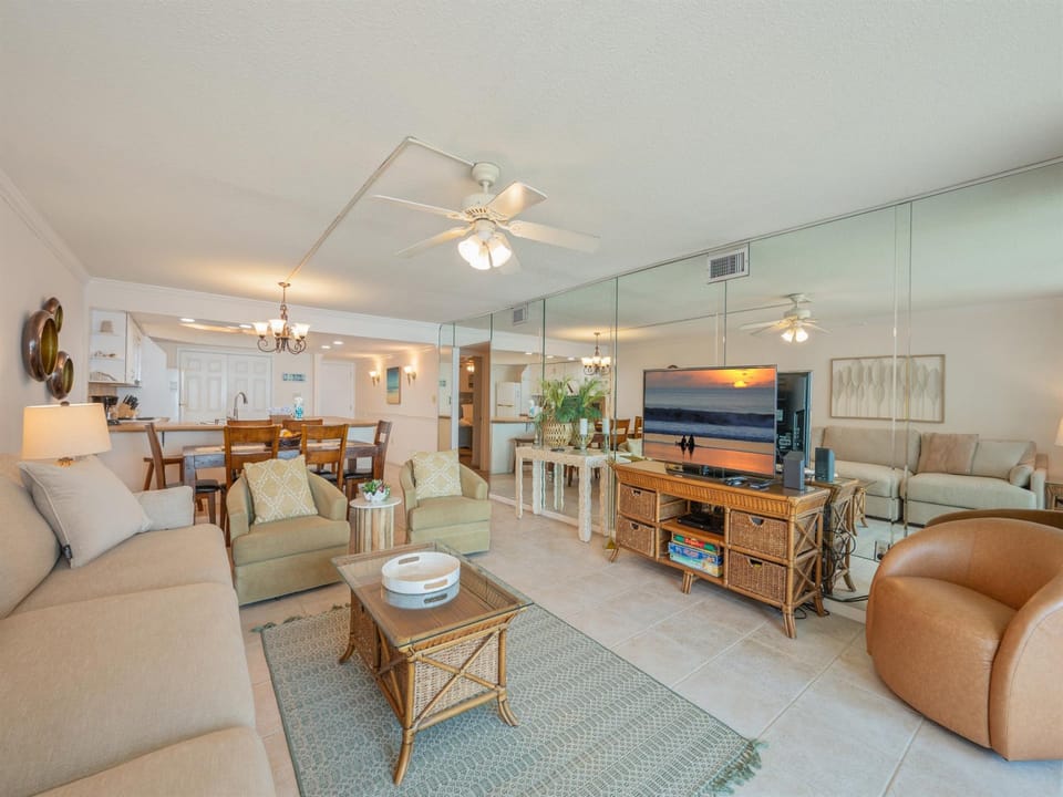 Relax in your spacious coastal retreat with ocean-inspired décor, comfortable seating, and an open layout perfect for gathering with loved ones.