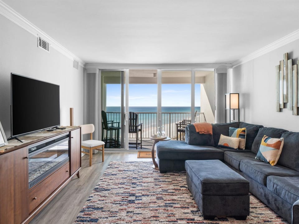 Sink into this plush sectional and let ocean waves fill your view through floor-to-ceiling windows.