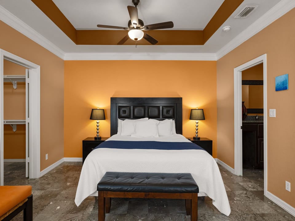 You'll love retreating to this spacious master suite, complete with a king bed and a warm, inviting atmosphere.