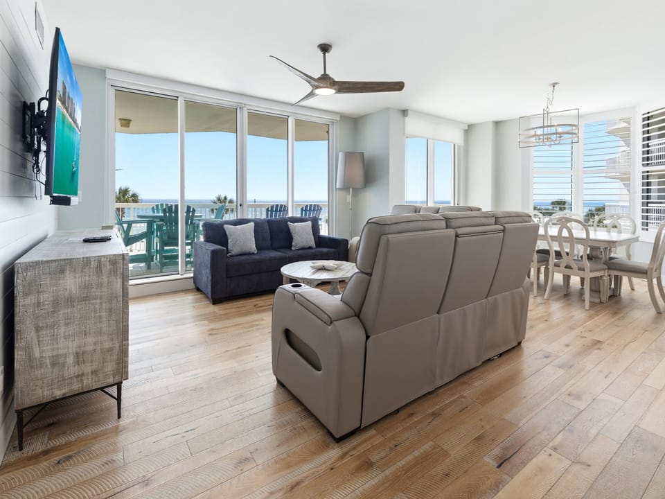 Relax in your modern living space with stunning ocean views and comfortable seating for memorable beach getaway moments.