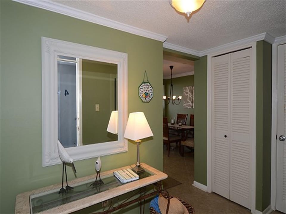 Settle into your peaceful green retreat with thoughtful touches and warm lighting creating the perfect ambiance for relaxation.