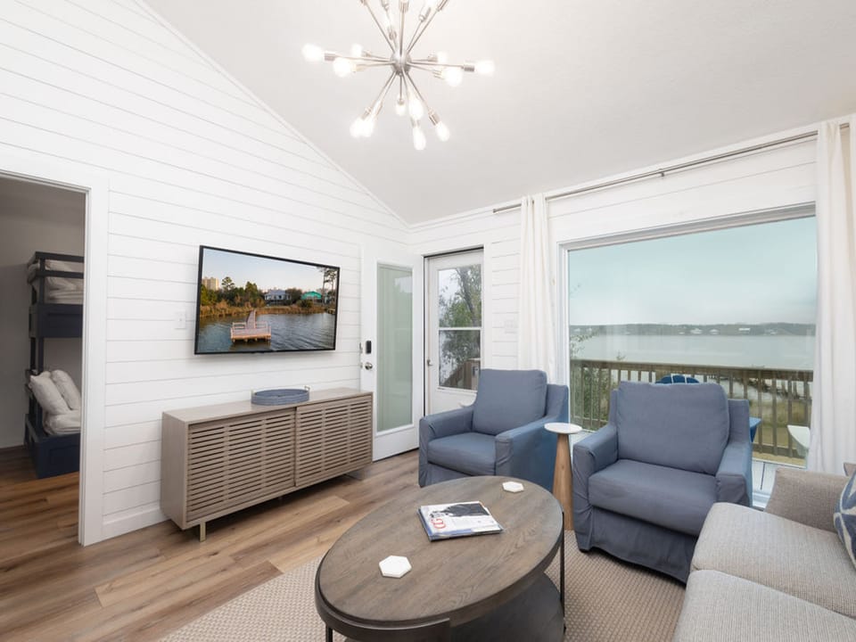 Relax while enjoying the gorgeous sunrise on Little Lagoon by day, and your favorite shows on the mounted television by night.
