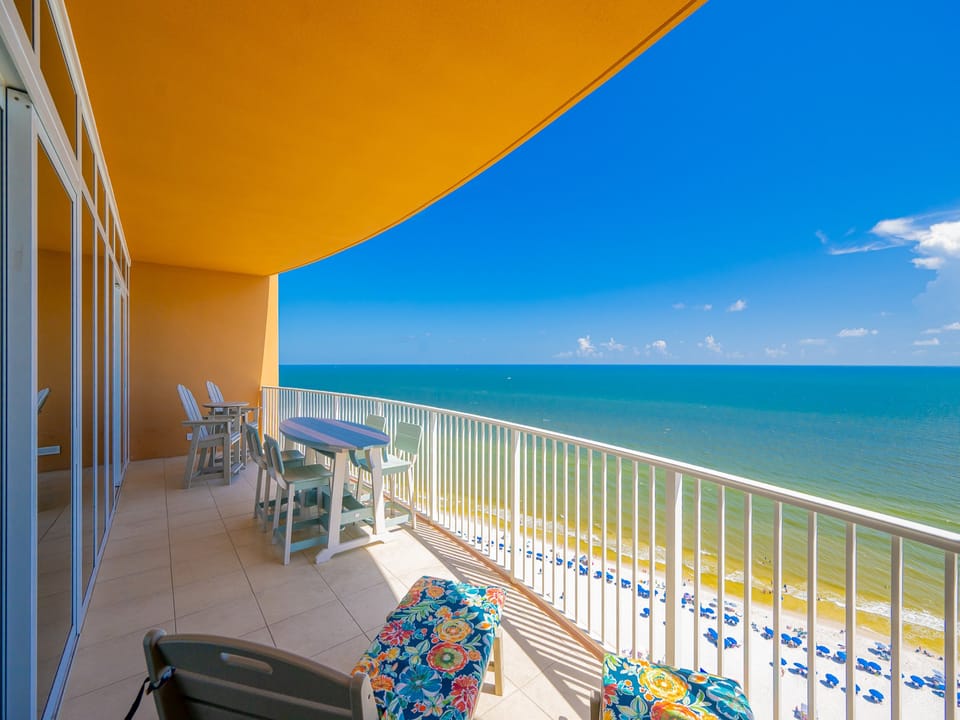 Bask in the sun from your comfy balcony seating, taking in stunning coastal views and the sounds of beach life