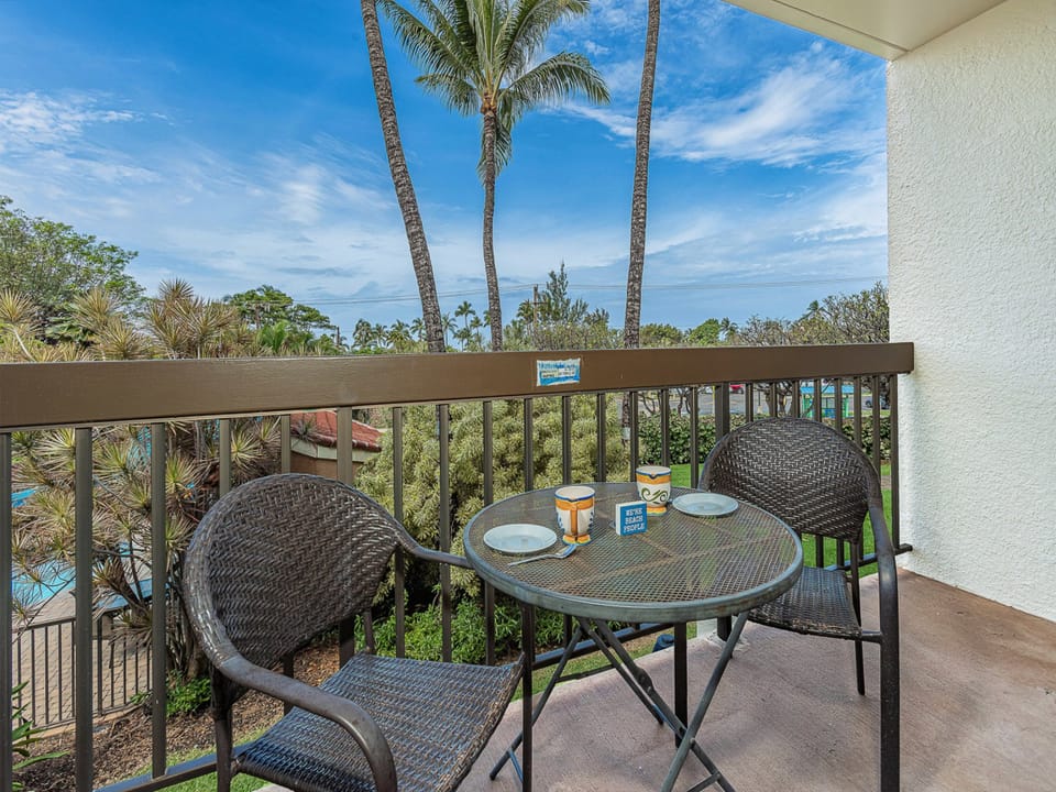 Start your mornings with coffee on your private balcony, surrounded by swaying palms and a peak-a-boo path toward the ocean.