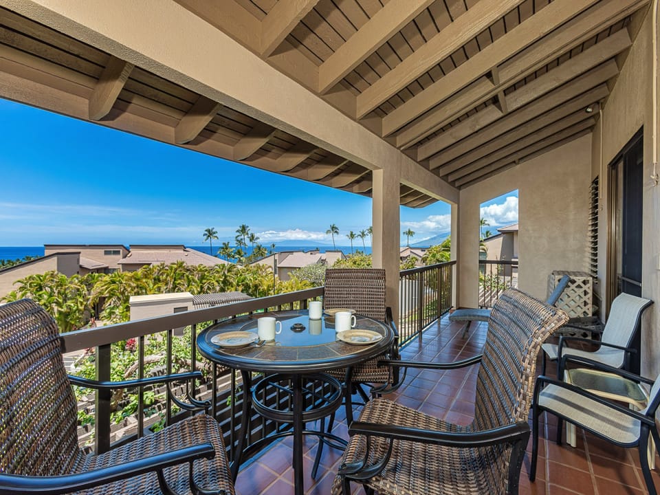 Your private balcony overlooks stunning ocean views and swaying palms, perfect for morning coffee.