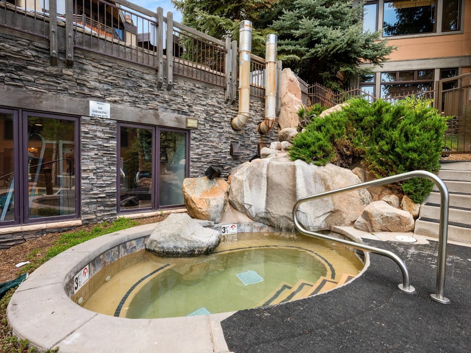 Soak in the mineral-rich hot springs with natural stone surroundings.