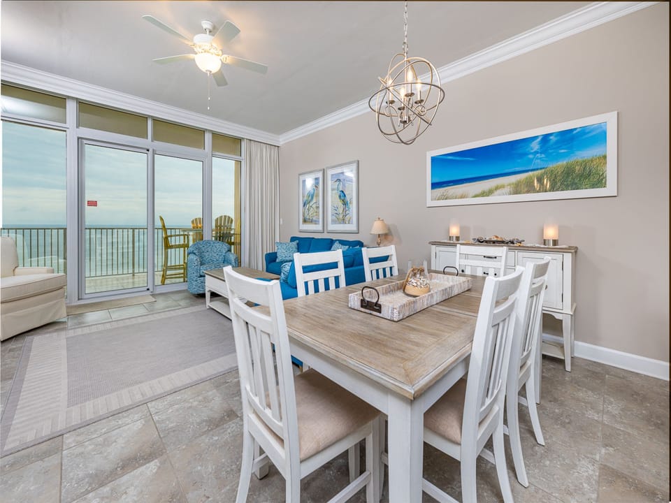 Soft coastal light fills the living room as you enjoy quiet moments gazing across the gulf from the balcony door