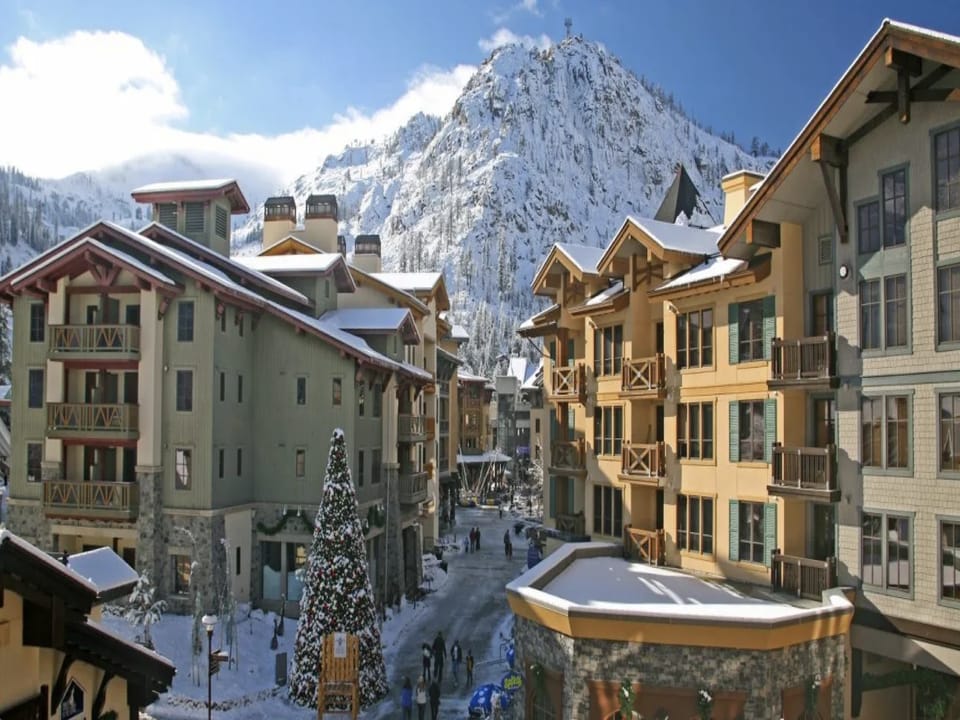 A picturesque alpine village nestled at the base of snow-covered peaks, offering year-round mountain recreation and stunning natural scenery. The property is centrally located within this scenic ski resort community.
