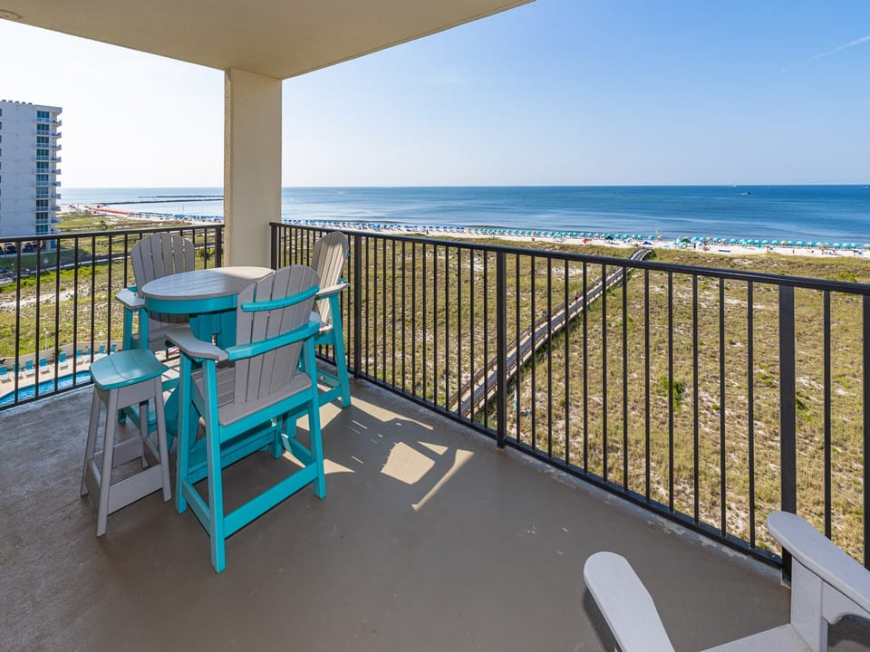Gentle coastal breeze cools your skin as you relax on your balcony watching waves meet the shore