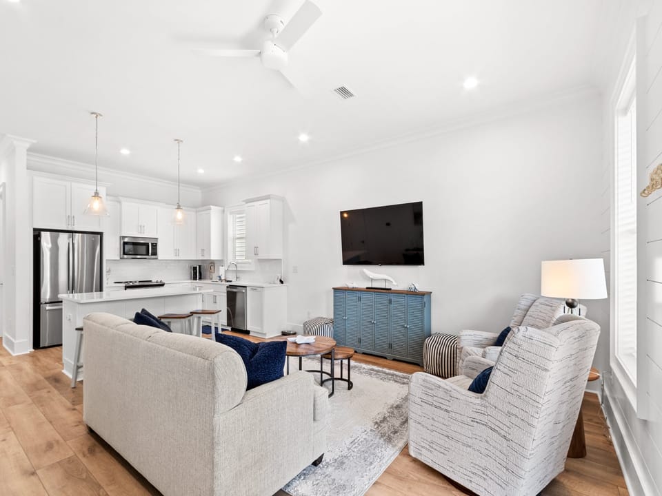 Light from the window fills the living room where you relax on soft seats and stream your favorite shows