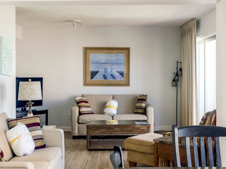 Settle into your own coastal escape with comfortable seating and nautical touches that capture the laid-back charm of beachside living.
