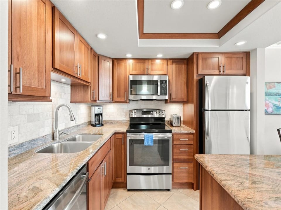 Cook up your favorite meals in this beautifully equipped kitchen with all the modern appliances you need for a comfortable stay.