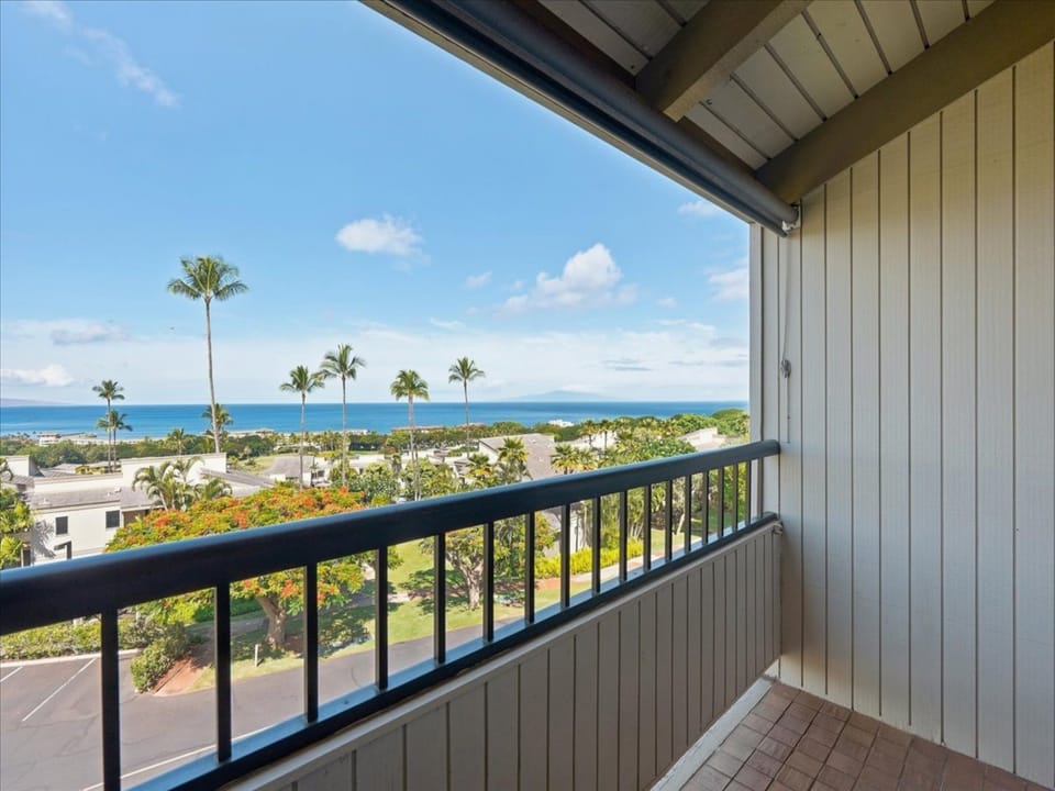 Take in sweeping ocean views and swaying palms from your private covered lanai, a perfect spot to watch the sun dance on the water.
