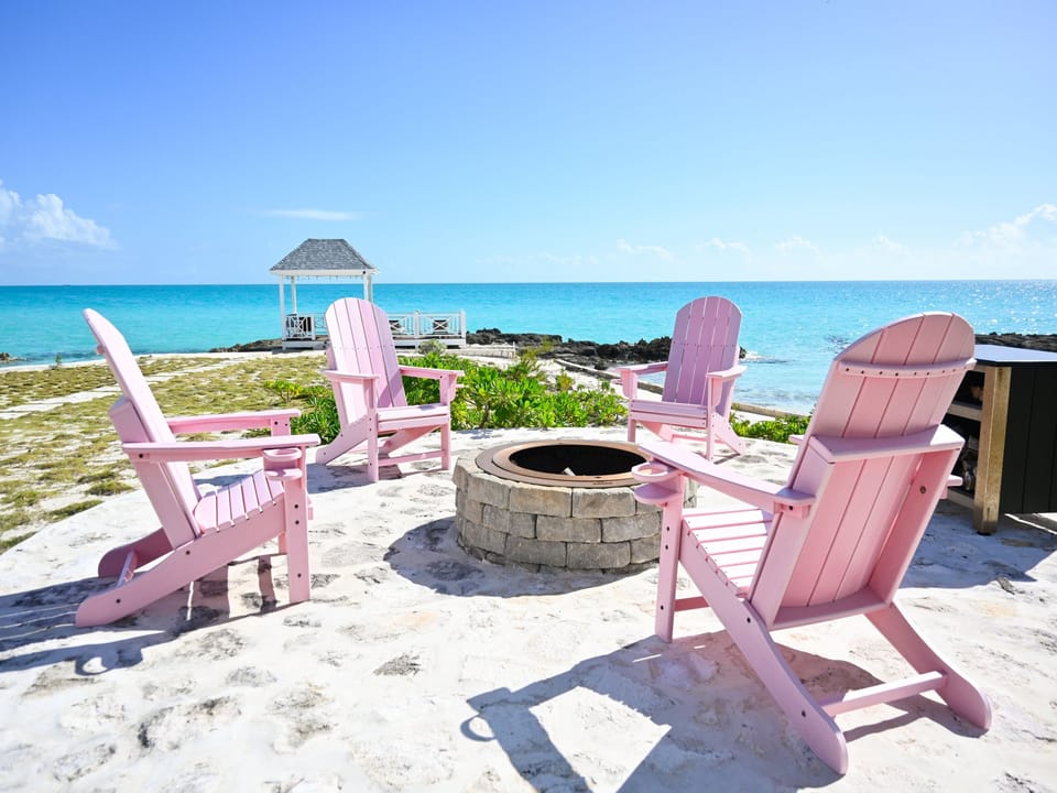 Oceanfront seating and a fire pit.